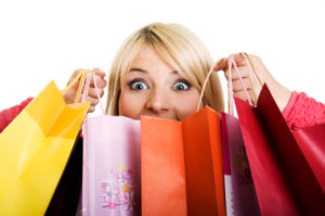 Excited shopping woman