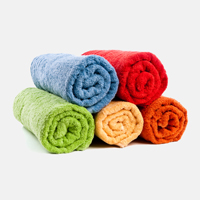 Multicolor rolled towels in a pile